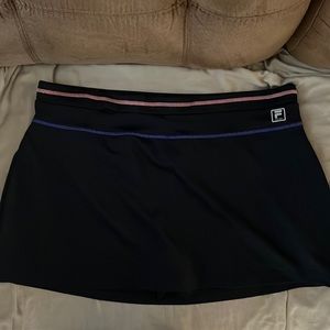 FILA Sport skort. Black with pink and purple trim.Size XL NWOT